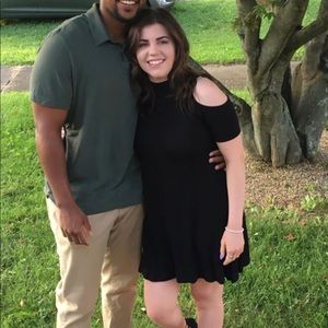 Cold shoulder black dress.